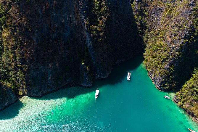 Full Day- Phi Phi Island & Maya Bay Snorkeling in Phuket & Lunch - Loh Samah Bay snorkeling: coral, fish, and included gear