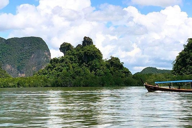 James Bond Island Sightseeing(No Canoeing) Tour by Longtail Boat from Phuket - Stop 1: Wat Suwan Khuha and that 15-meter golden reclining Buddha