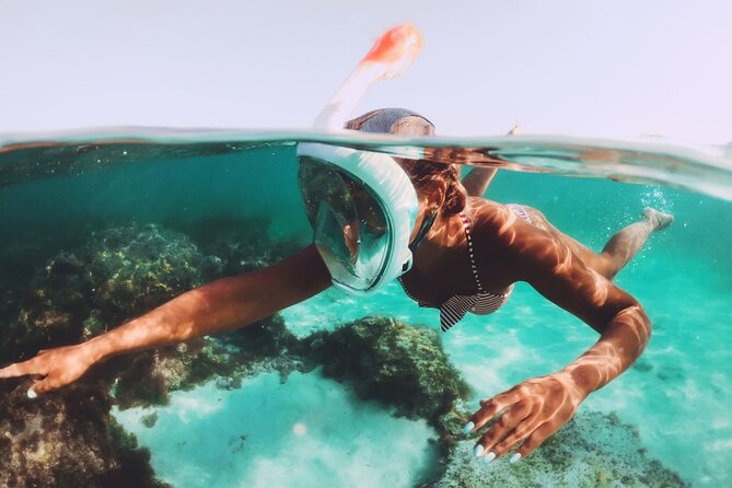 Khai Islands Speedboat Trip Half Day Tour - Stop 2: Khai Nui Island for Snorkeling and Coral-Fish Spotting (About 20 Minutes)