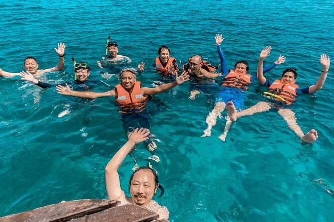 Koh Rok and Koh Ha Private Boat Tour - Ko Lanta and Koh Rok Noi: beach time plus a picnic-style setup
