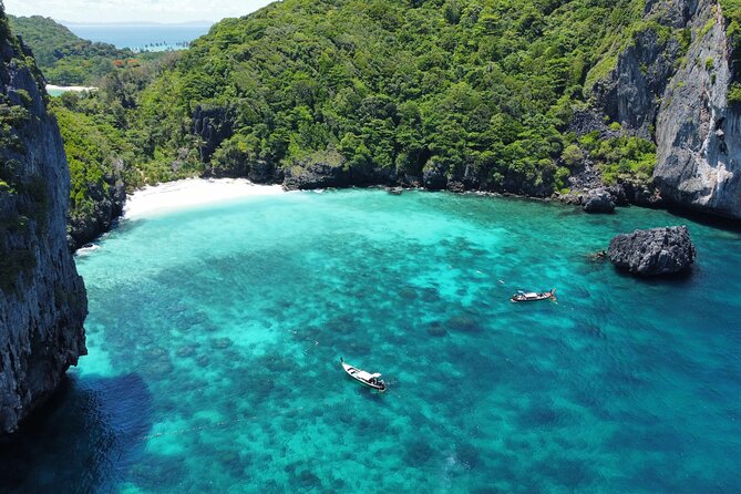 One Day Phi Phi, Maya And Khai Islands Adventure - Pileh Bay: emerald water and limestone cliff swimming