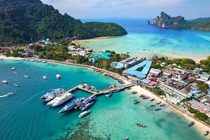 One Way Phi Phi Island Cruise with Normal Seats to/from Phuket - Pickup, decks, and arriving at Tonsai Beach