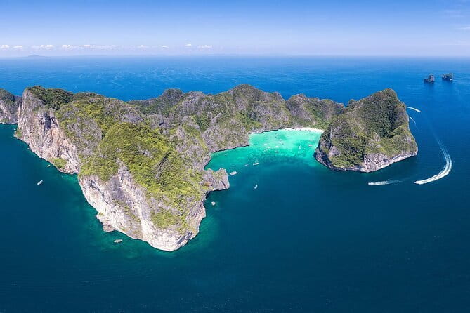 Phang Nga Bay Day Trip to Panak and James Bond Island by Speedboat from Phuket - Koh Rang Yai and optional Naka Island: warm water, shade, and a calmer ending