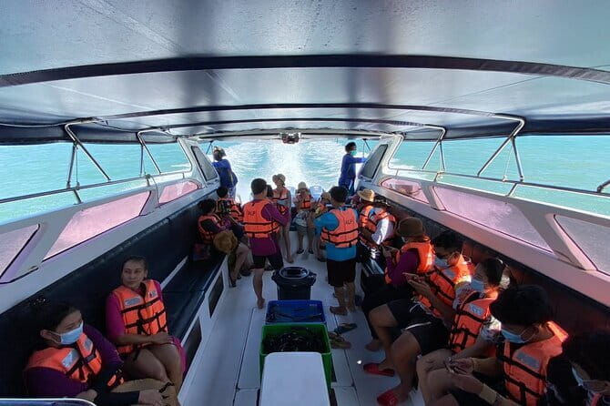 Phang Nga Bay Day Trip to Panak and James Bond Island by Speedboat from Phuket - Koh Ngai: snorkeling, beach time, and a resort buffet that actually fuels the day