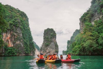 Phang Nga Bay Sunset Cruise Dinner with Sea Canoe and Loy Krathong from Phuket - Hong Island canoeing: the cave views are the main attraction