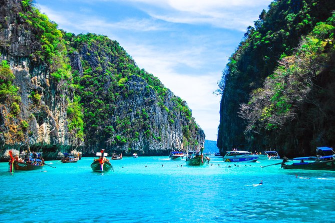 Phi Phi and Khai Islands Snorkeling Tour with Lunch by Speedboat - Snorkeling and paddleboarding: what you can realistically expect underwater