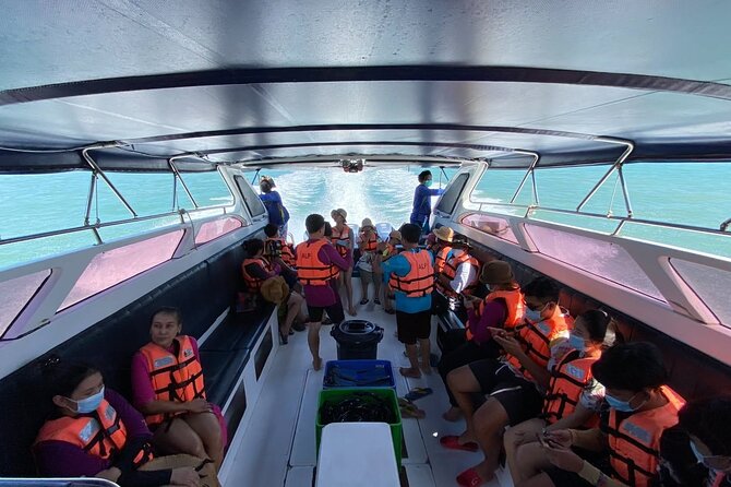 Phi Phi Island Hopping Day Trip by Speed Boat from Phuket - Maya Bay: the lagoon, the short time, and black tip reef sharks