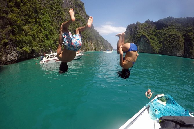 Phi Phi Islands Day Tour Bamboo and Maya Bay with Lunch By Speedboat - Monkey Beach: seeing wildlife from a speedboat (for a reason)
