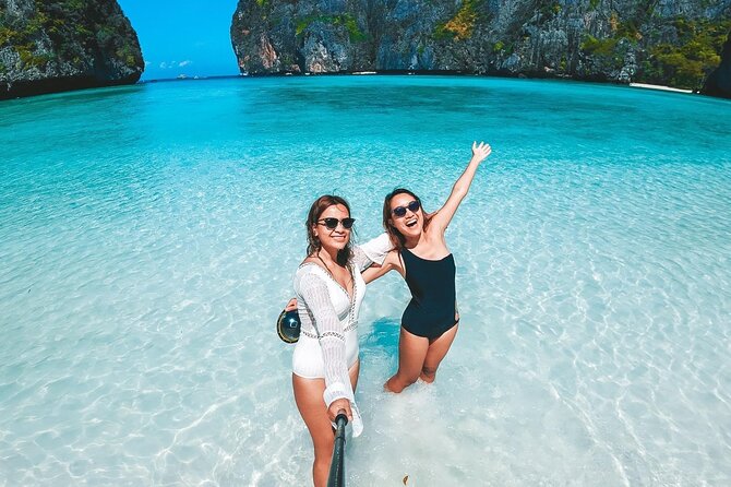 Phi Phi Islands Snorkeling Tour with 7 Stops & Lunch from Phuket - Viking Cave, Maya Bay, and The Beach filming points from the water
