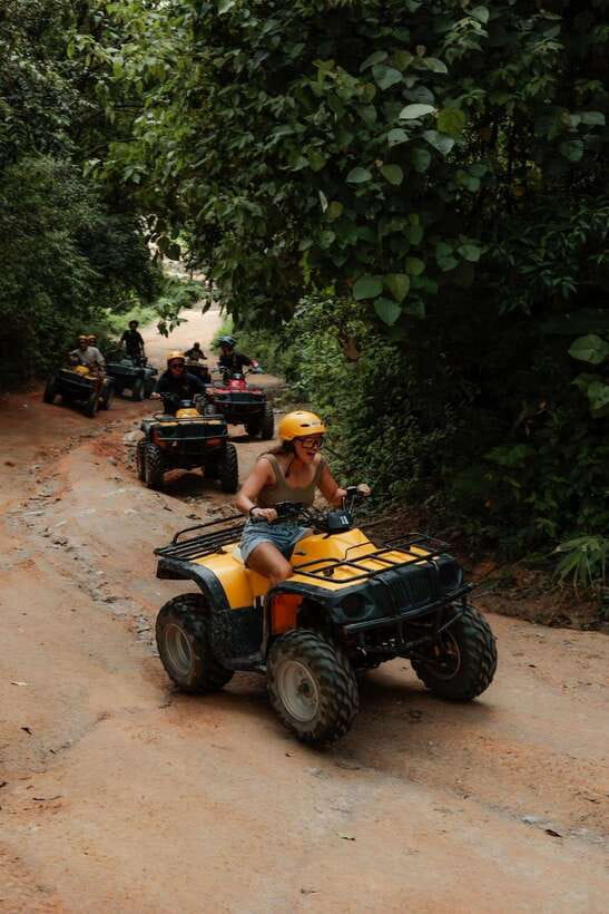 Phuket: ATV Adventure with Big Buddha Viewpoint Option - Driving the ATV through rugged forest terrain