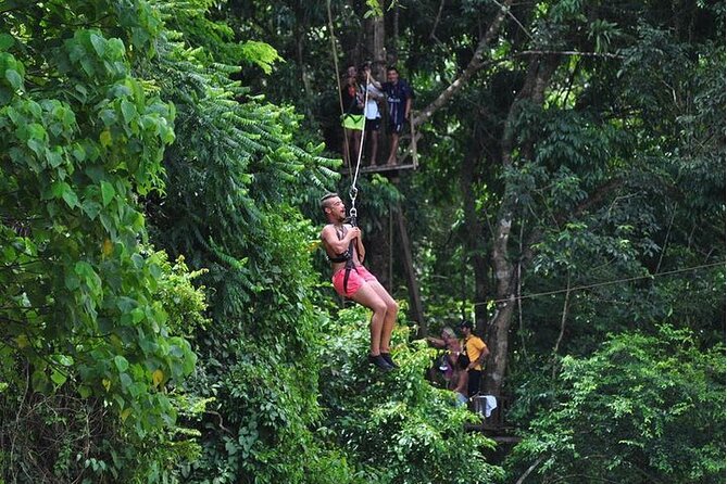 Phuket-Phang Nga: White Water Rafting 7 km.-Zipline-ATV-Lunch - James Bond Bay add-ons: Tam Lod canoeing and Panyee village