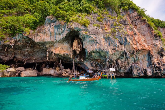 Phuket: Phi Phi Islands, Maya bay & Khai Island Tour by Speedboat - Phi Phi Don: snorkel choice and the Alida Restaurant lunch flow
